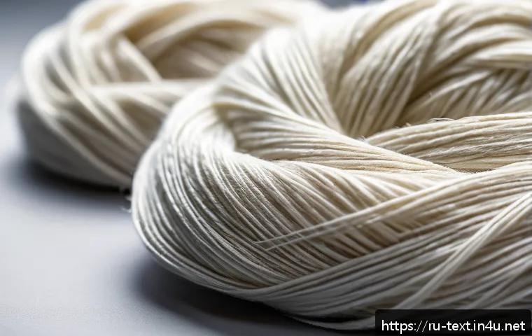 섬유기사 필기 과목별 요약 노트 - A high-resolution close-up image of various modern textile fibers arranged side by side on a neutral...